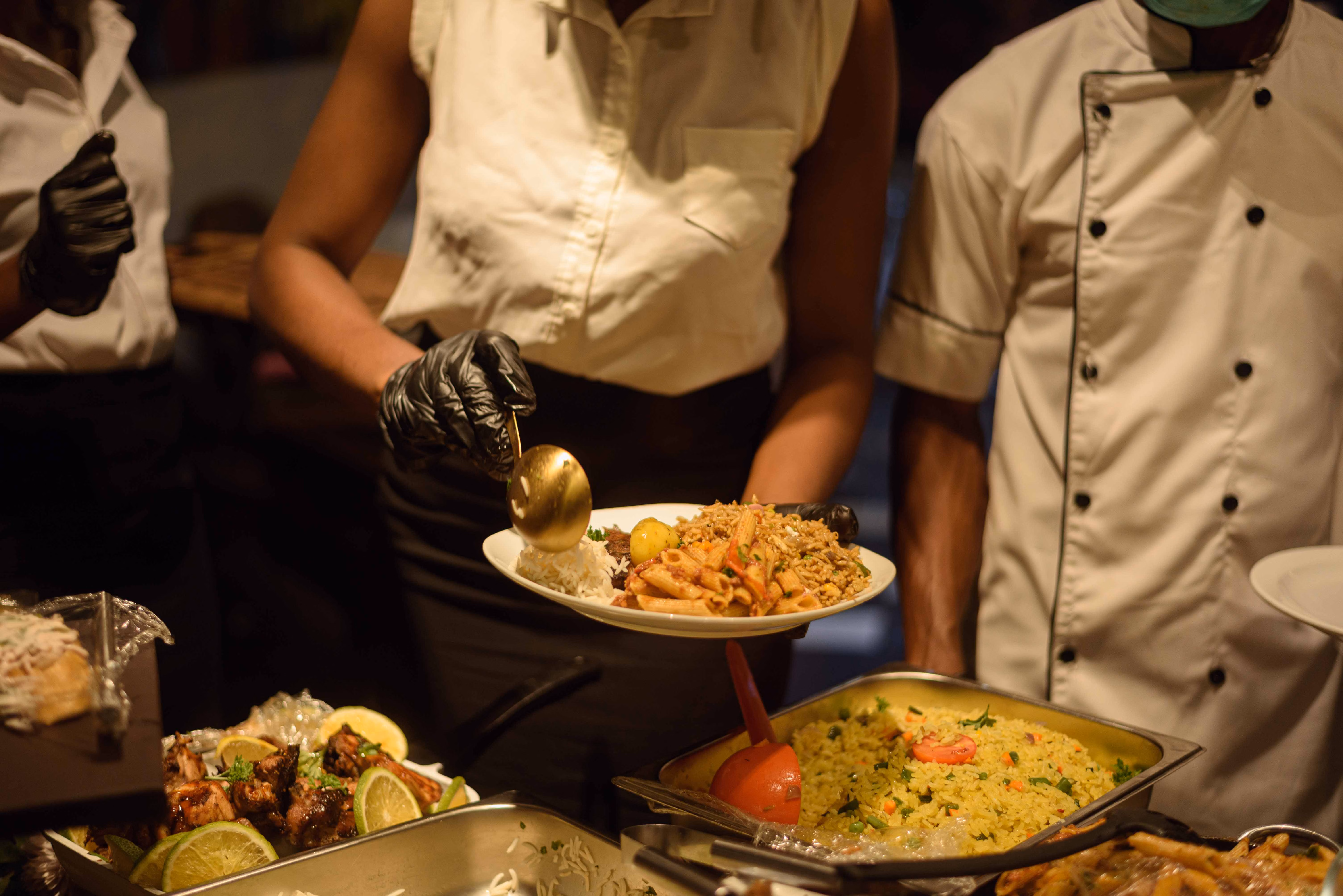 Chef plating a fine dining course